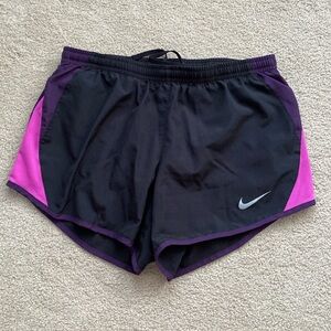 Nike dri-fit athletic shorts, size small. black and purple